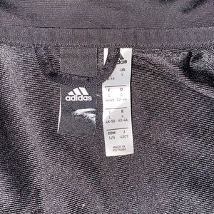 classic style red adidas shorts size large